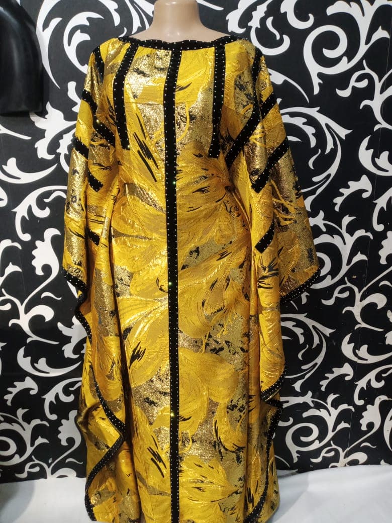 Gold brocade kaftan with black beading, African luxury fashion Houston Texas